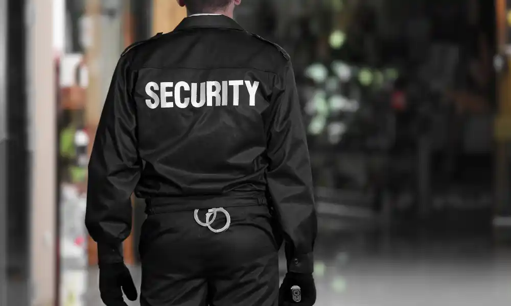 Armed security guard protecting a commercial site in Boston, MA